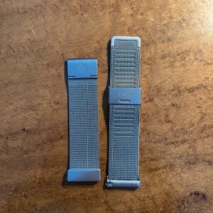 Fitbit Versa Stainless Steel band plus 5 silicone bands.